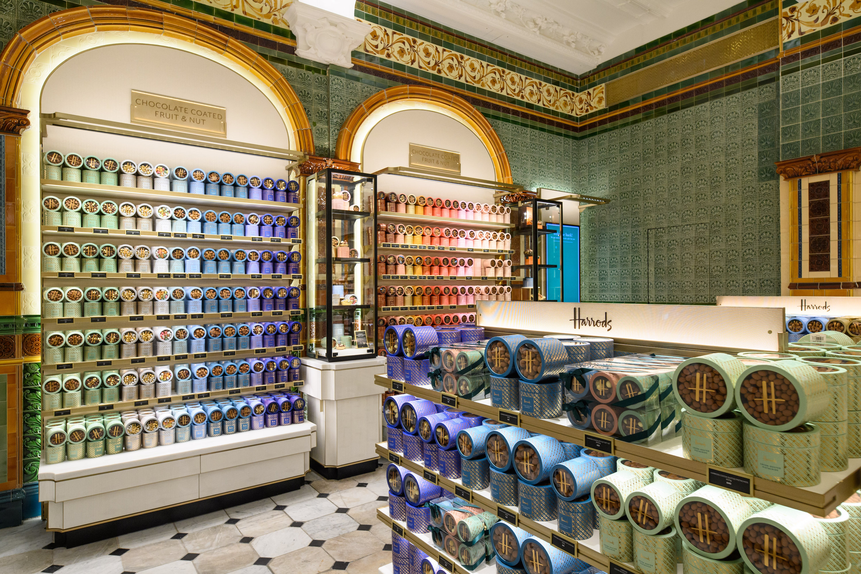 Harrods Chocolate Hall London featuring luxury retail LED lighting design